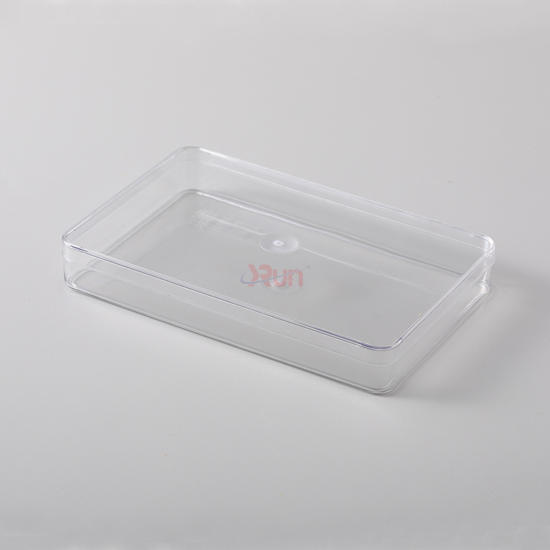 Our sleek rectangular plastic jars are a perfect insert for the modern clear boxes design, creating an attractive plastic cookie container for sophisticated chocolate packaging.